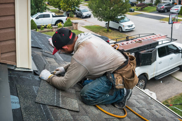 Professional Roof Replacement technician working in Prague, OK